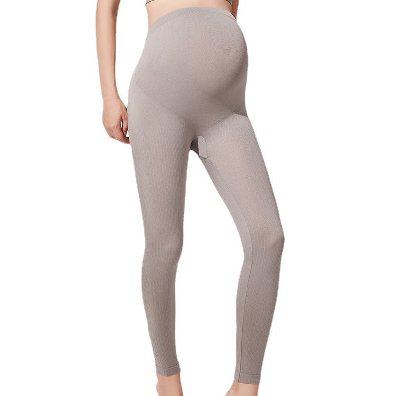 Autumn and winter pregnant women's leggings do not drop the crotch high elastic waist support abdomen slightly pressure pregnant mother nine-point long johns for sale in stock