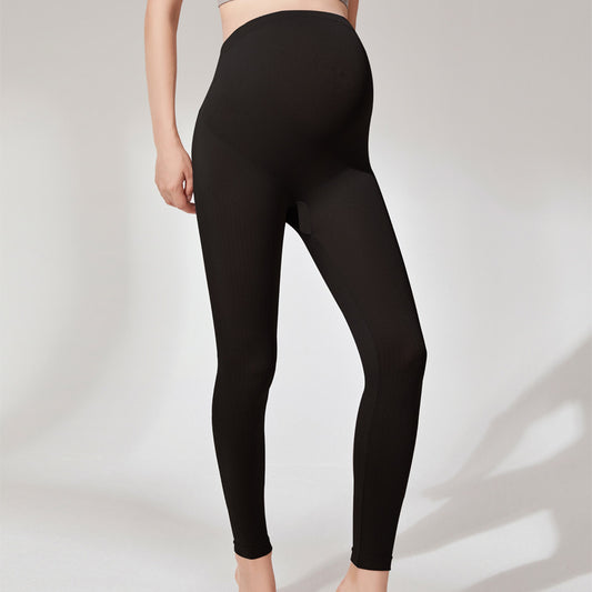 Autumn and winter pregnant women's leggings do not drop the crotch high elastic waist support abdomen slightly pressure pregnant mother nine-point long johns for sale in stock